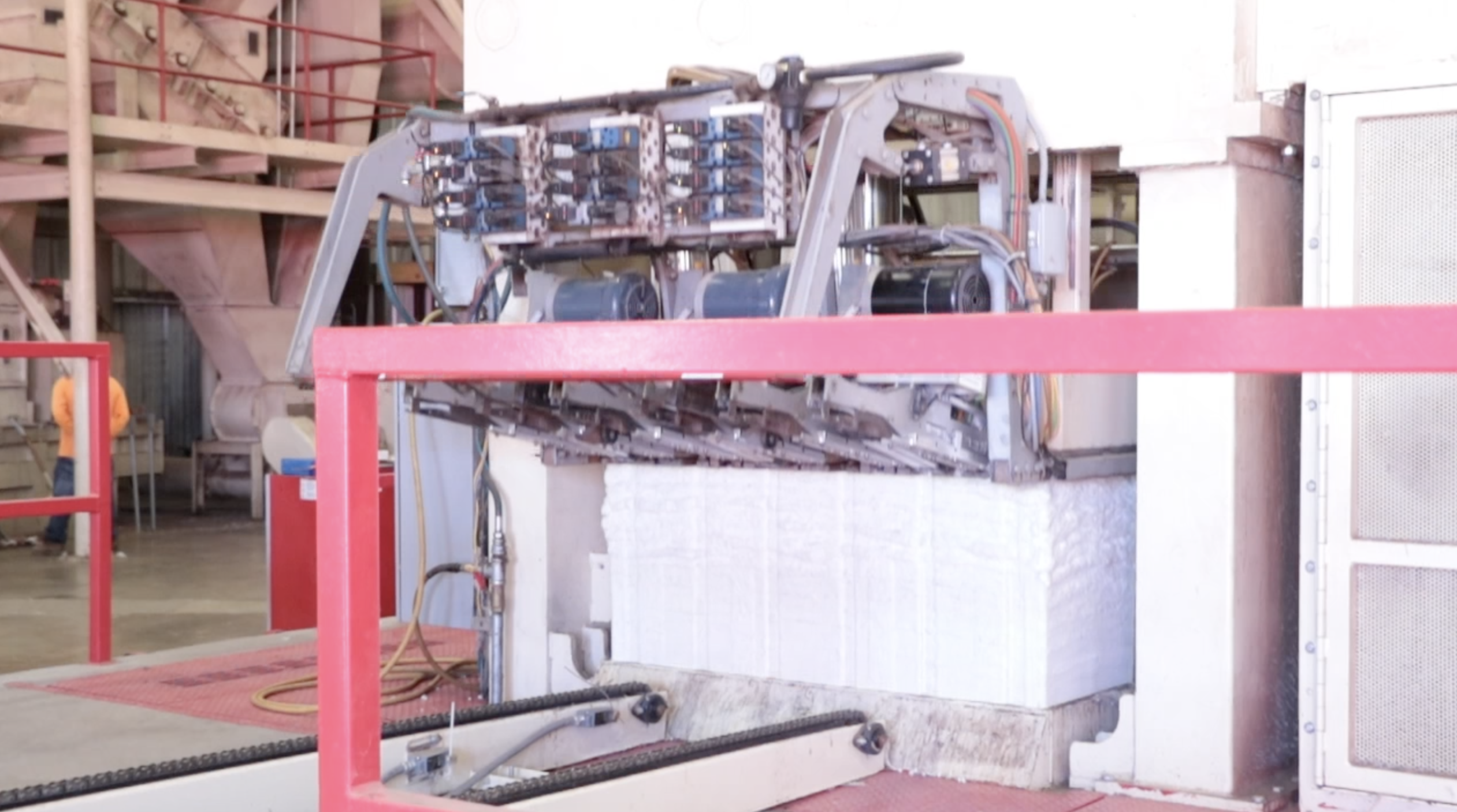 Once the cotton is cleaned, it is compressed into bales that will be sold.